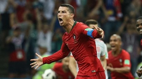 Cristiano Ronaldo of Portugal celebrates after scoring his