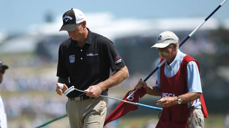 Jim Furyk on the 3rd hole with his