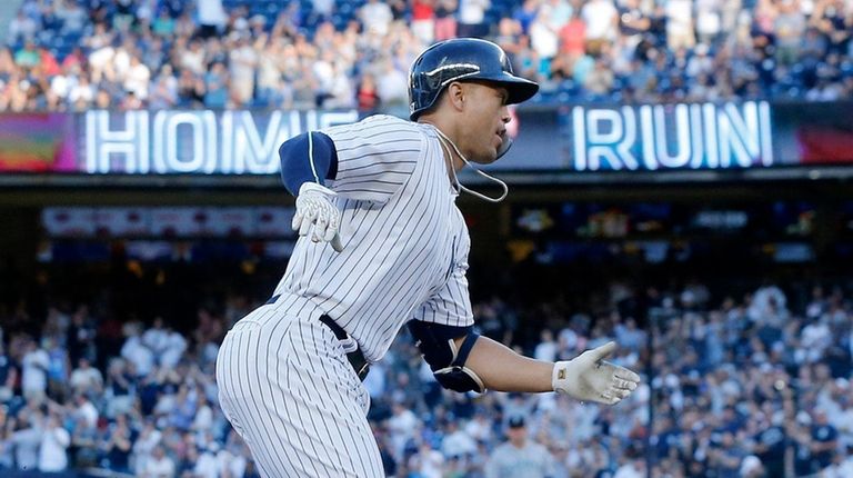 Giancarlo Stanton of the Yankees runs the bases