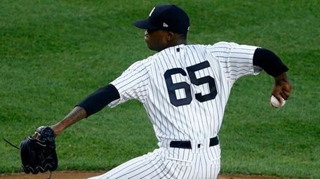 Yankees pitcher Domingo German delivers in the fourth