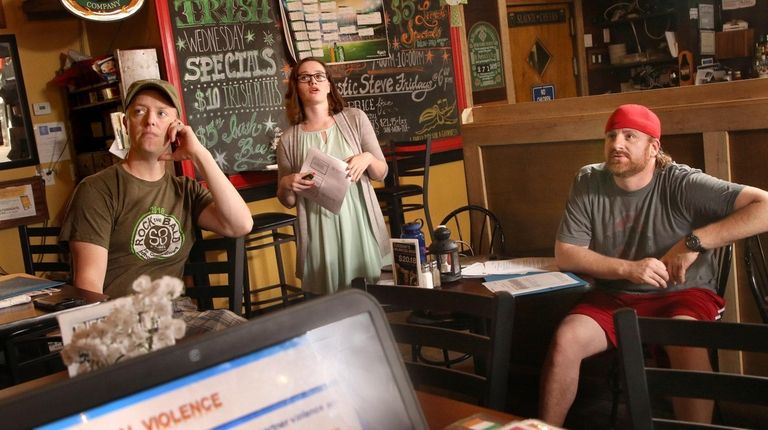 Fulton's Gate Irish Pub owner James Gilroy, left,