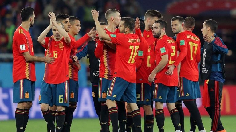 Spain players celebrate following the 2018 FIFA World