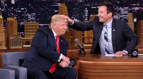 Jimmy Fallon's playful moment mussing President Donald Trump's