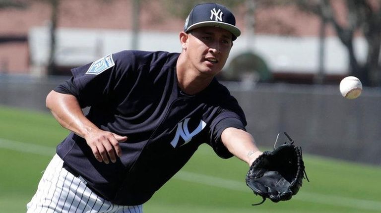 Yankees pitcher Giovanny Gallegos does drills at spring