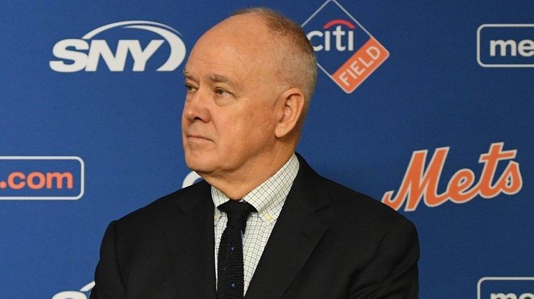 Mets general manager Sandy Alderson looks on during