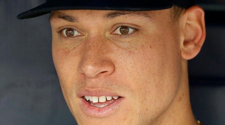 The Yankees' Aaron Judge looks on from the