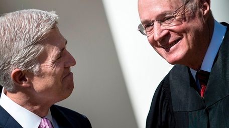 Neil Gorsuch, left, with Supreme Court Justice Anthony