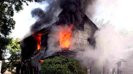 A fire rips through a Roosevelt home Tuesday.