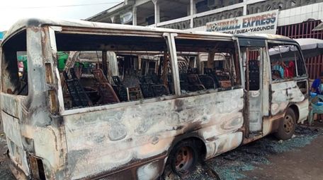A July 10 photo shows burned buses at