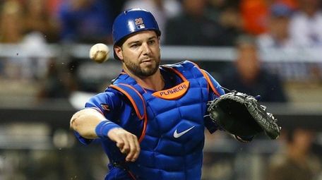 Catcher Kevin Plawecki of the Mets throws against