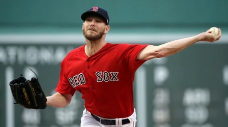 Red Sox starting pitcher Chris Sale delivers to