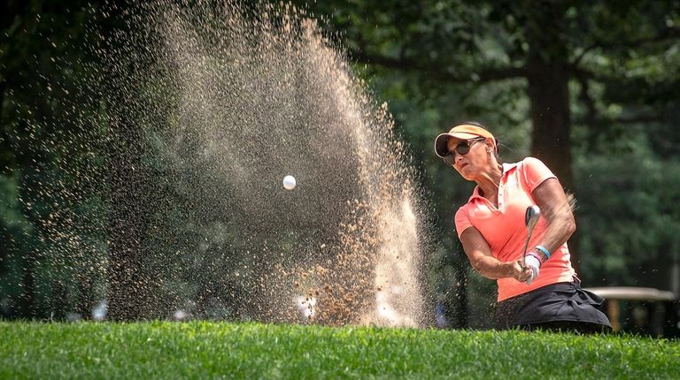 Ana Bertuglia of Dix Hills hits out of
