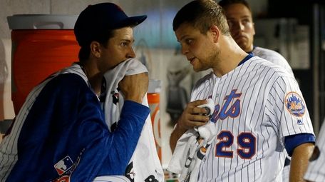 Jacob deGrom and Devin Mesoraco of the Mets