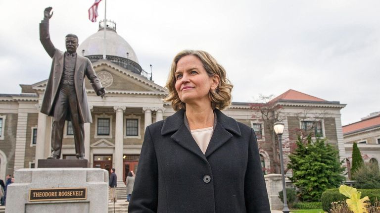 Nassau County Executive-elect Laura Curran speaks outside the