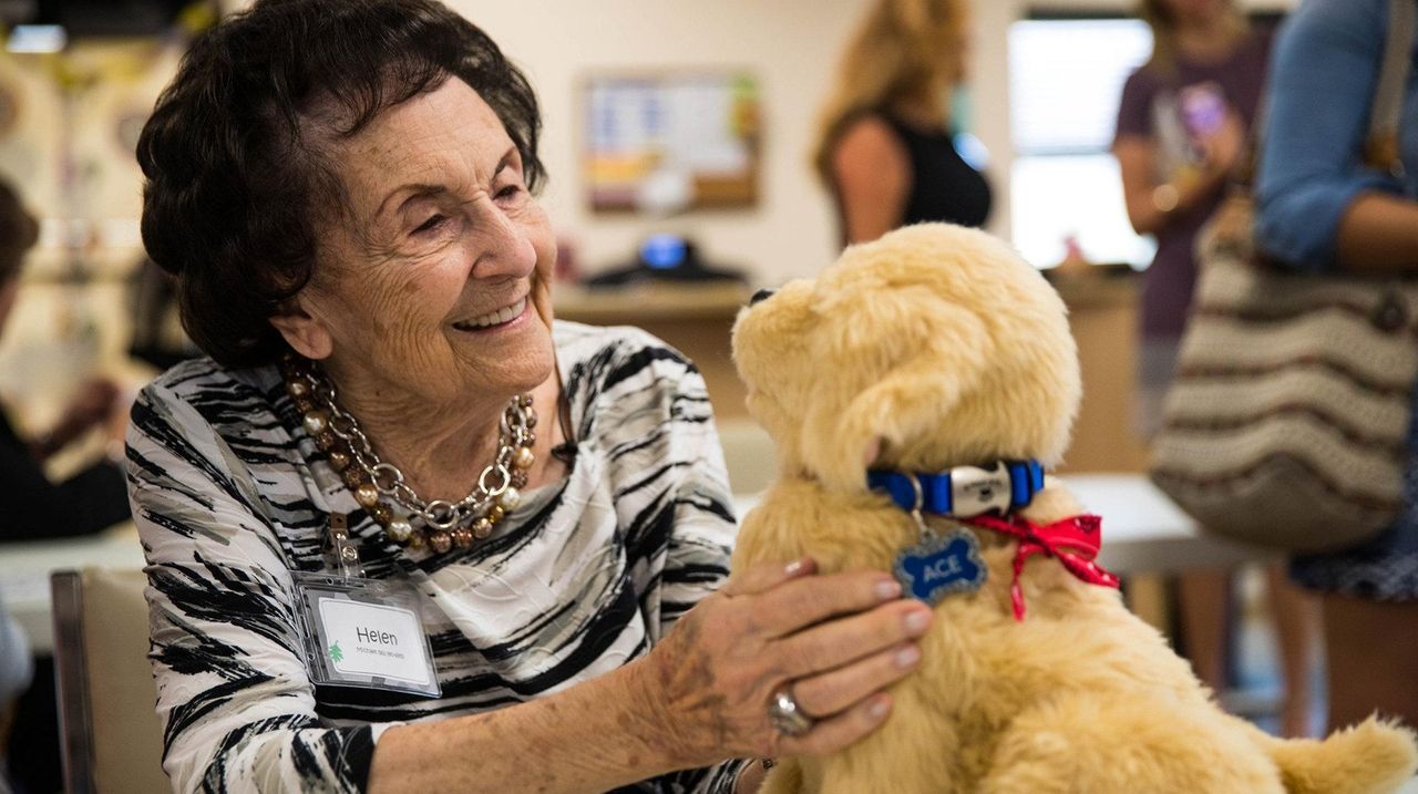 Good to Know: Robot cats, dogs can help dementia patients ...