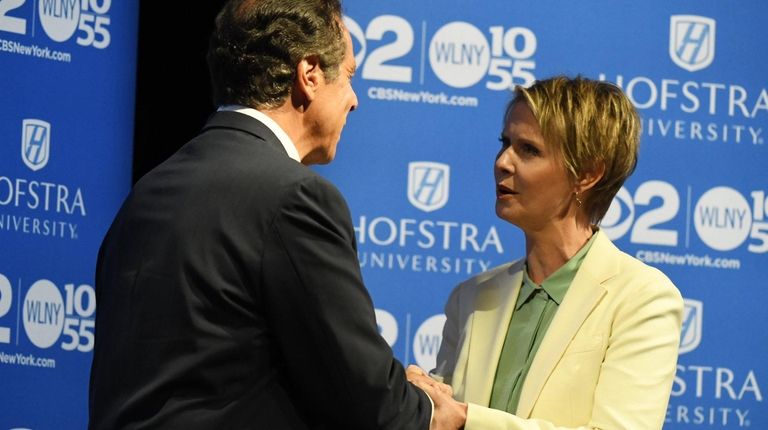 Gov. Andrew M. Cuomo and Cynthia Nixon arrive