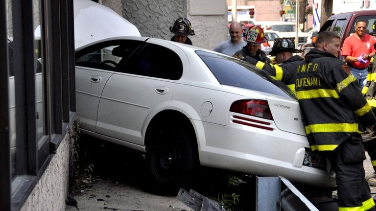 A Dodge Stratus smashed into Bravo Supermarket in