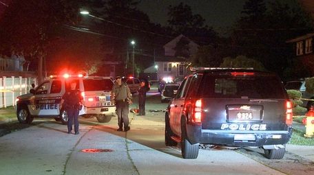 Police at the scene of the shooting in