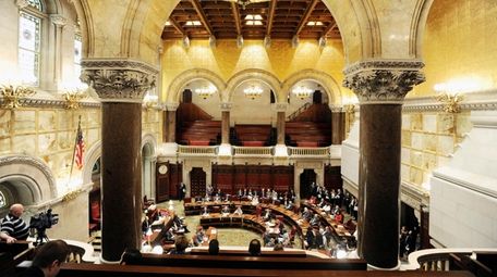 Members of the State Senate work on budget