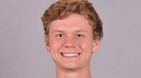 Whitman's Jack Poplawski poses for a photo on