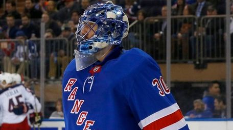 Rangers goalie Henrik Lundqvist reacts after surrendering a