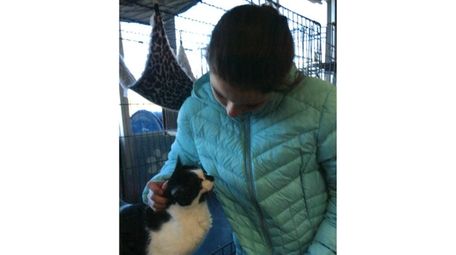 Kidsday reporter Elizabeth Rosado volunteers to help with