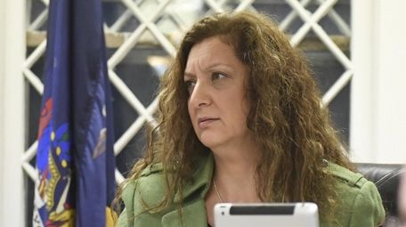 Then-Trustee Julie Albernas during a meeting of the