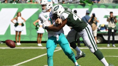New York Jets linebacker Jordan Jenkins sacks Miami