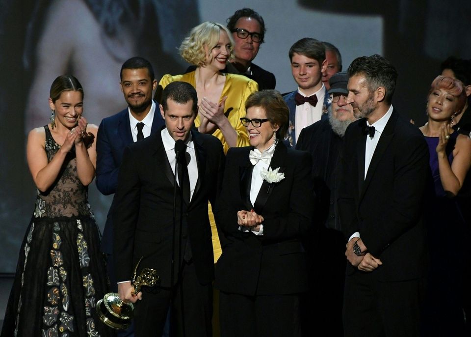 Writer-producer D.B. Weiss, center left, and the cast