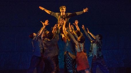 Spencer Bang, center, plays Peter in "Peter and
