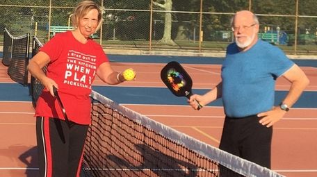 Elizabeth and Michael Katz on the pickleball court
