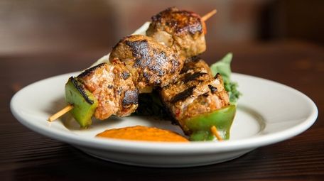 Pinchos morunos (marinated pork skewers) at NoaMar Market