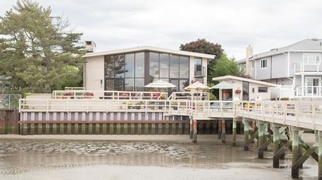 The Atlantic Beach house's deck comes with a