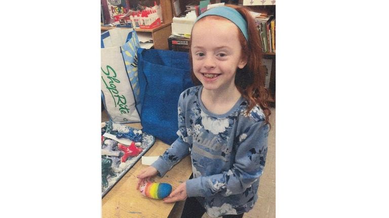 Kidsday reporter Beatrice McKeon with a painted rock.