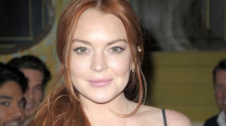 Lindsay Lohan attends Love X Fashion X Art