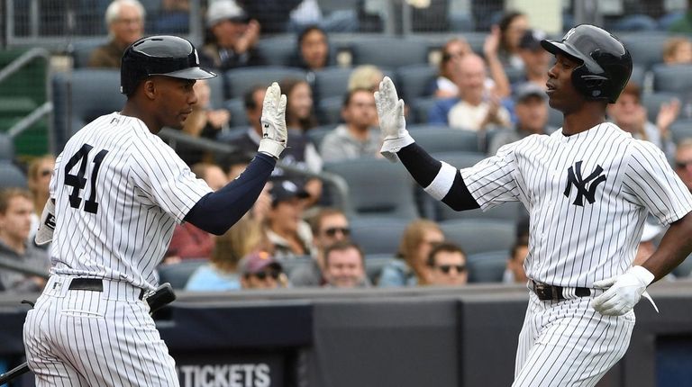 Yankees third baseman Miguel Andujar and Andrew McCutchen