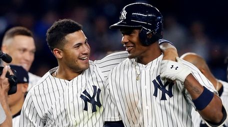 Gleyber Torres, left, and Miguel Andujar of the