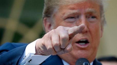 President Donald Trump speaks during a news conference