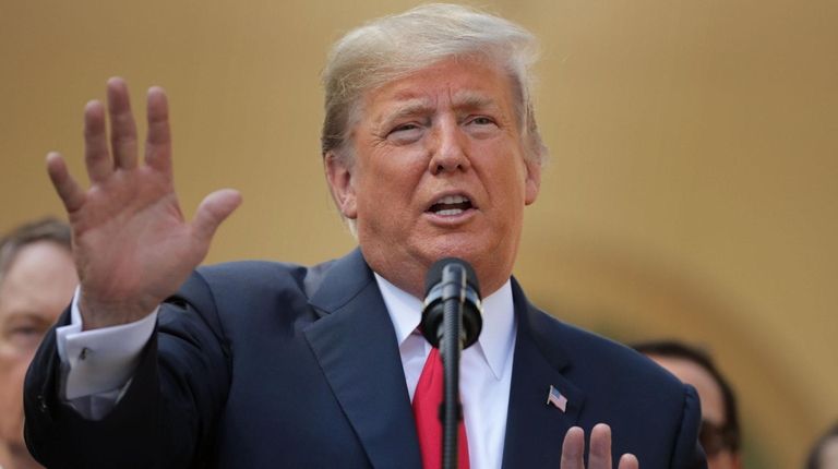 President Donald Trump speaks in the Rose Garden