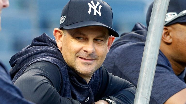 Manager Aaron Boone #17 of the New York