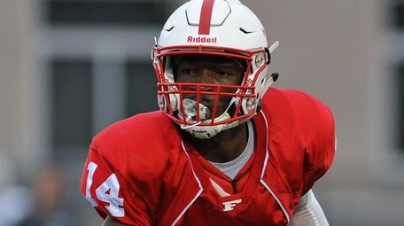 Freeport quarterback Terrance Edmond scrambles for a gain