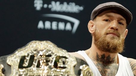 Conor McGregor speaks during a press conference for