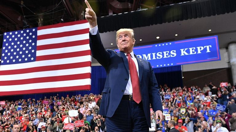 President Donald Trump arrives to a rally at