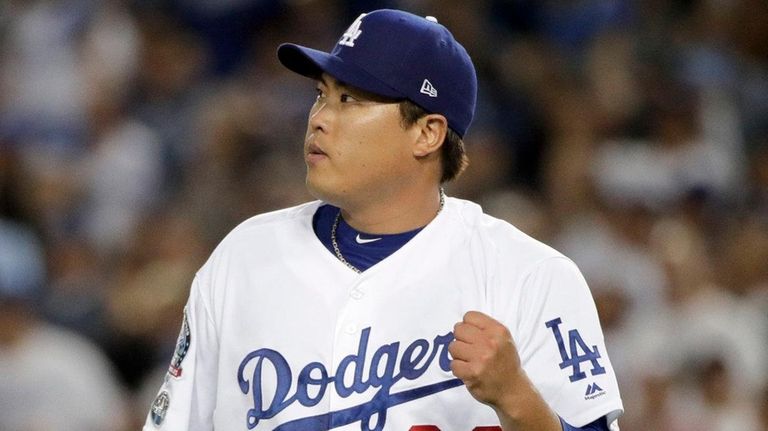 Los Angeles Dodgers starting pitcher Hyun-Jin Ryu celebrates