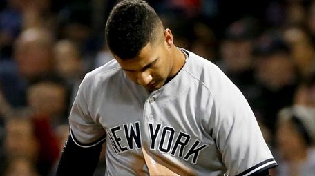 New York Yankees' Gleyber Torres reacts after striking