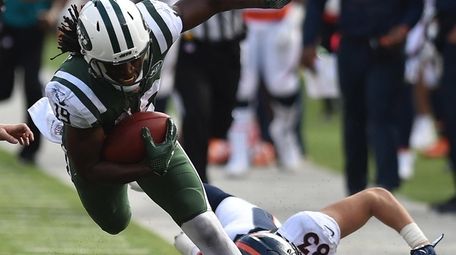 Andre Roberts stays inbounds on a long punt