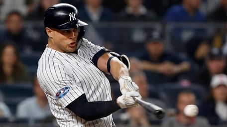 Yankees DH Giancarlo Stanton connects on a second-inning