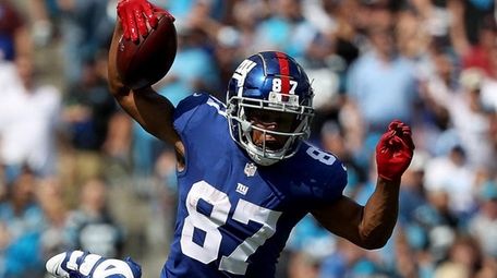 Sterling Shepard of the Giants jumps over James