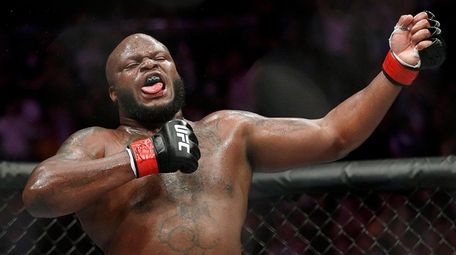 Derrick Lewis celebrates after defeating Alexander Volkov during