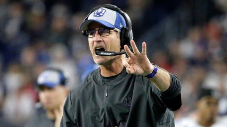 Colts coach Frank Reich signals from the sideline